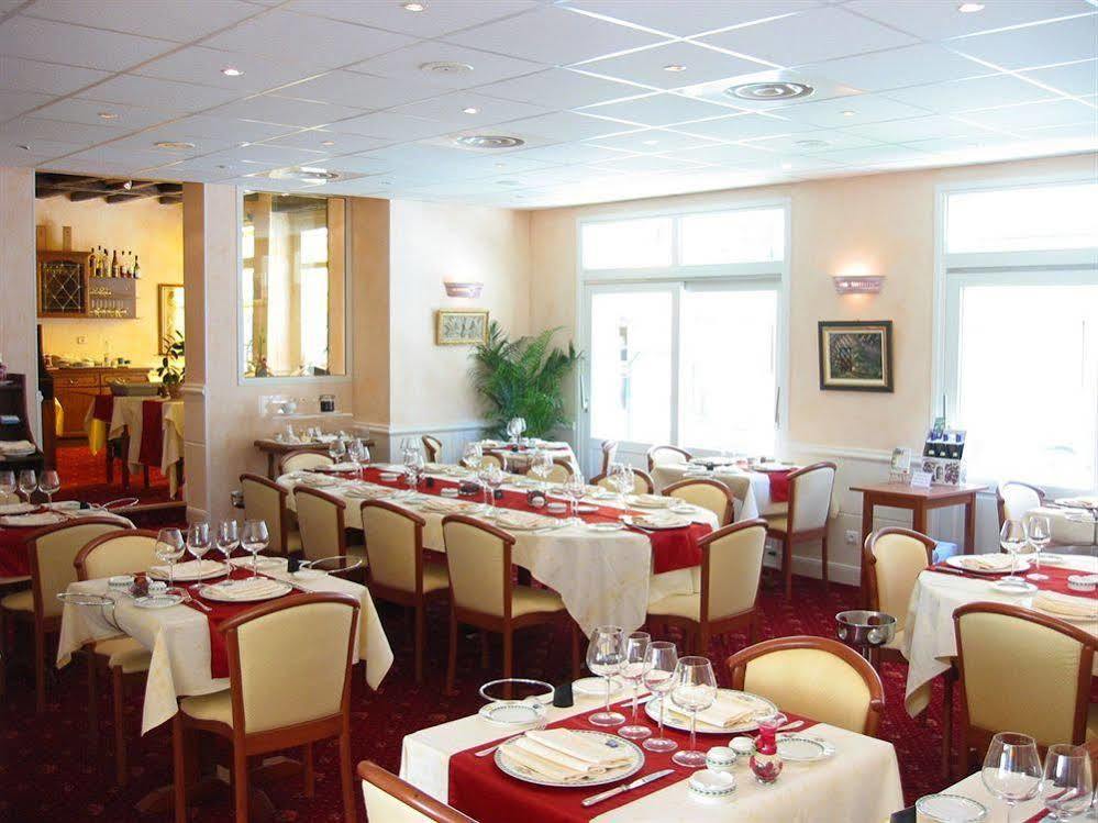 Logis Hotel Restaurant La Boule D'Or 希农 外观 照片